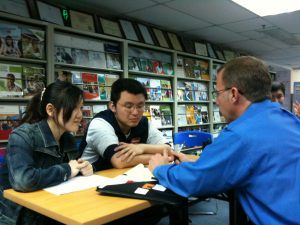 Mark Montgomery works with Chinese students