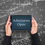 admissions open text displayed in the tablet