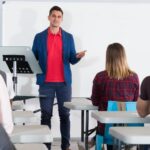 teacher and students in a classroom