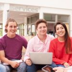 group of students sitting in college