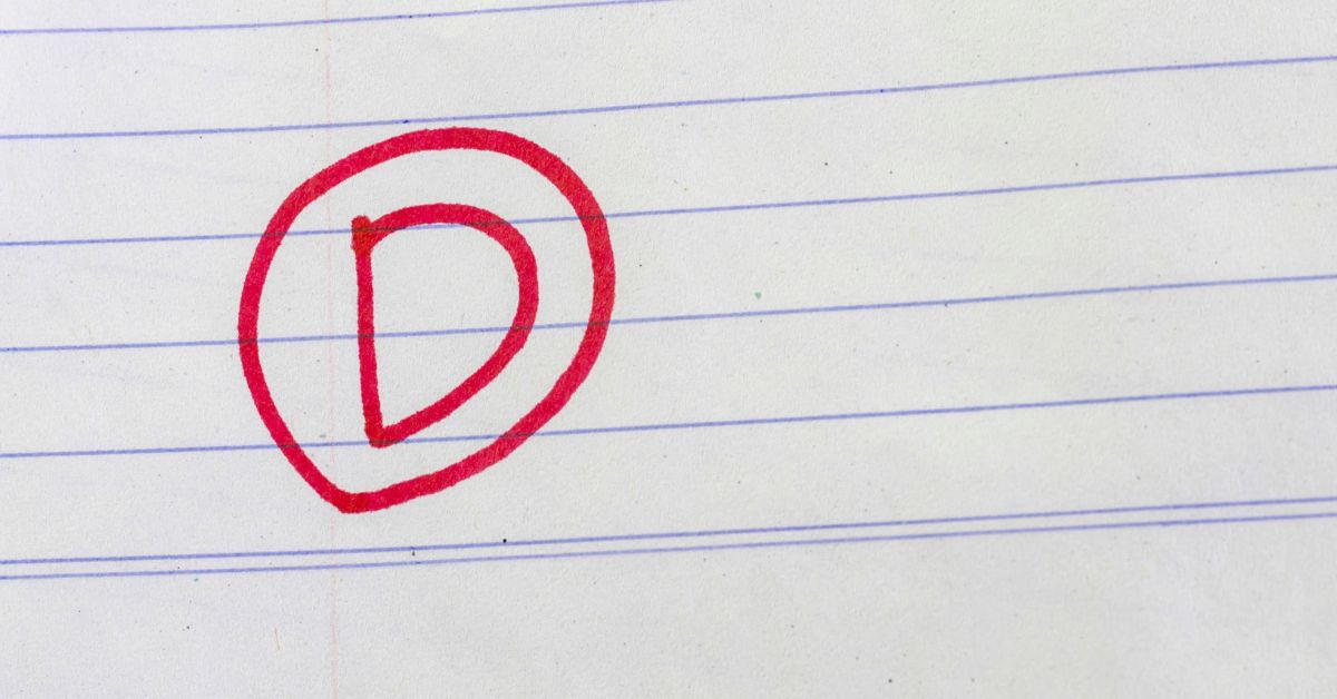 D grade written on paper