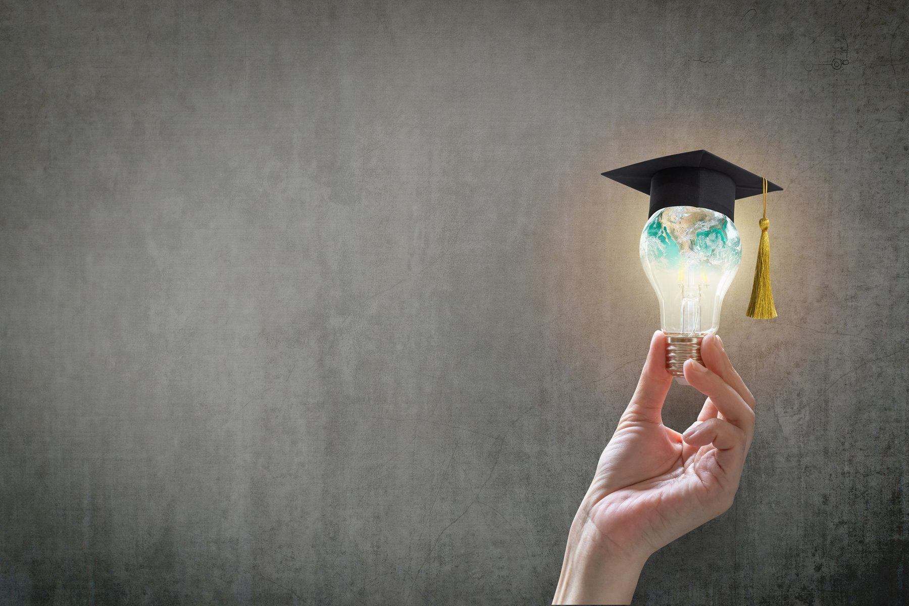 lightbulb on teacher chalkboard