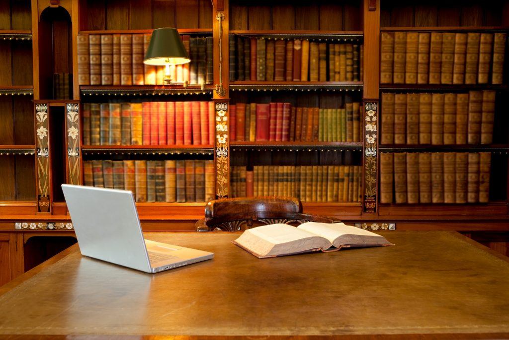 a room in a library with a table