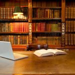 a room in a library with a table