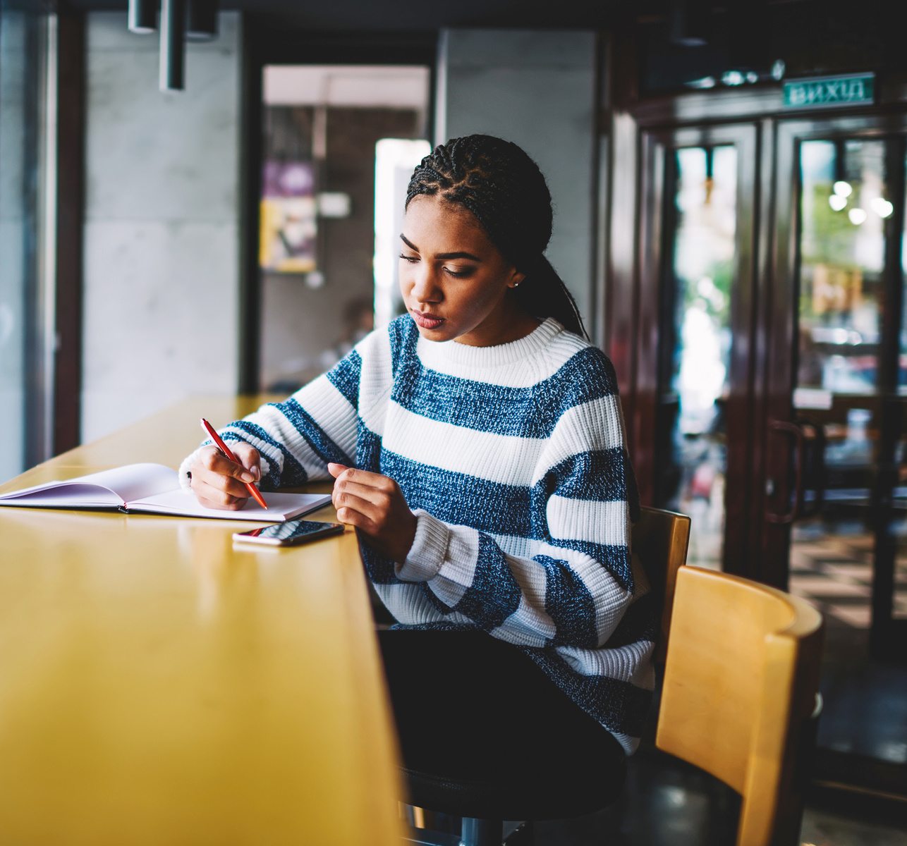 a girl writing an essay