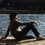 young man on banks of Seine