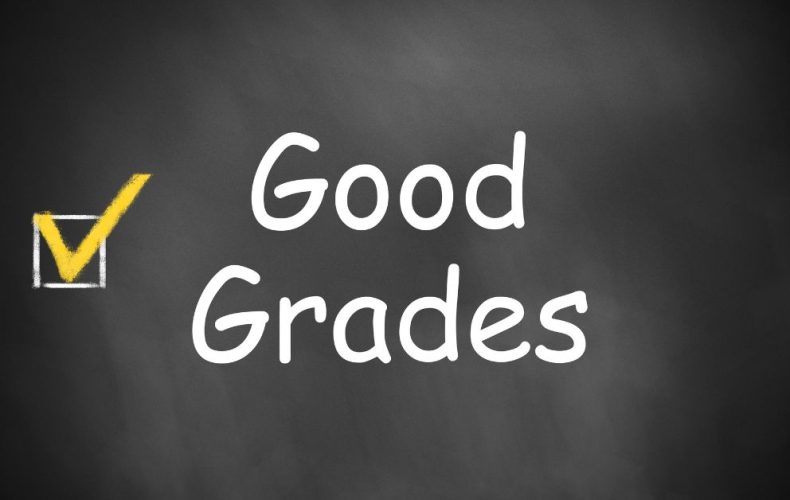 good grades text written on a black board