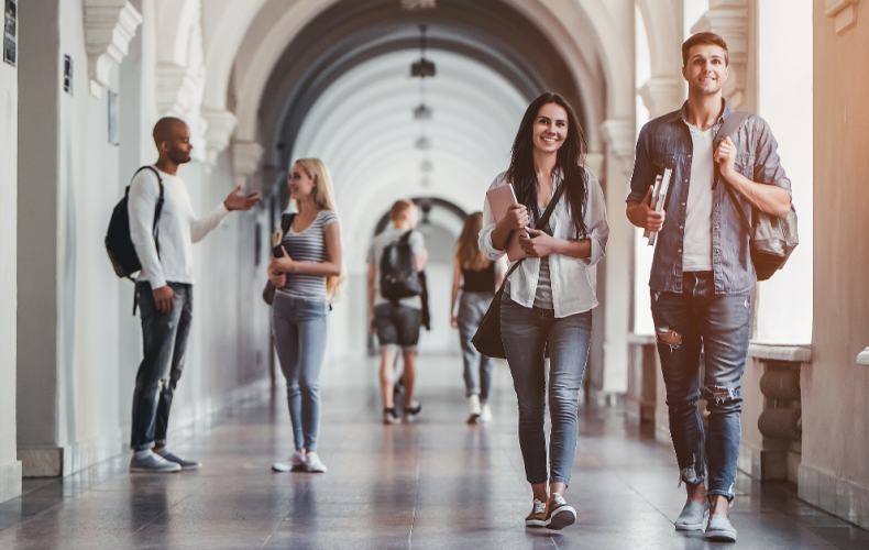 students walking in college campus