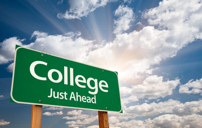 A street sign that says " College Just Ahead"