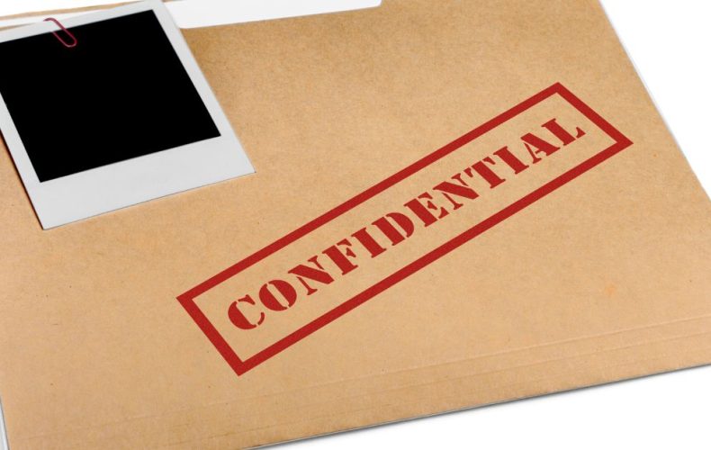 confidential written on envelope