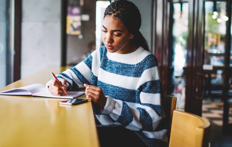 a girl writing an essay