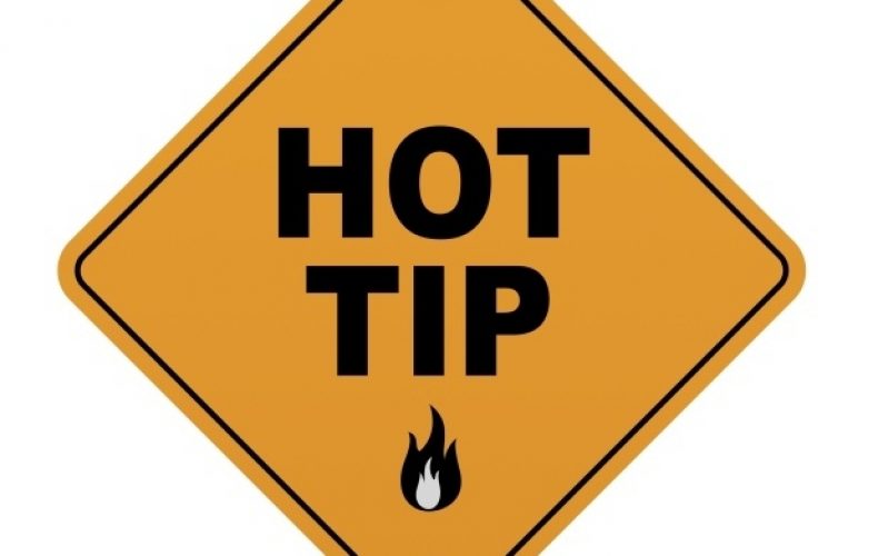 street sign reading hot tip